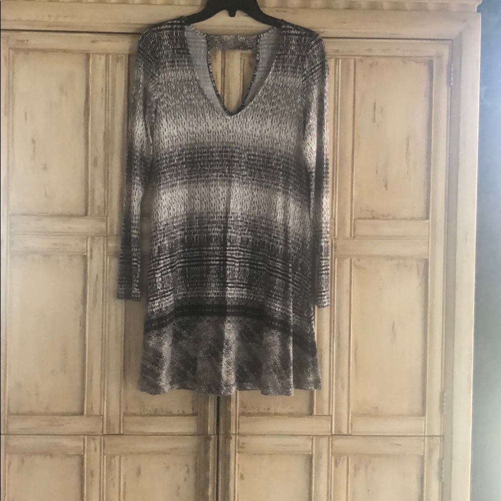 Adorable mini swing dress.